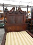 Mahogany framed single bed with carved swan neck headboard, on turned tapering legs,