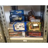 Quantity of Corgi boxed diecast model vehicles to include buses, Minis, gold plated Landrover, etc.