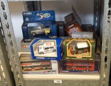 Quantity of Corgi boxed diecast model vehicles to include buses, Minis, gold plated Landrover, etc.