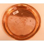 20th century copper dish of circular form, the centre decorated with a galleon,