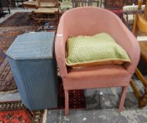 Lloyd Loom style tub chair together with a Lloyd Loom linen basket (2)