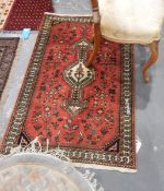 Handmade Persian wool rug with pink ground,