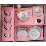 Boxed child's teaset, three teddy bears, two Action Man figures, two small dolls,