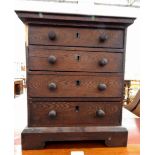19th century oak miniature chest of drawers with moulded edge top,
