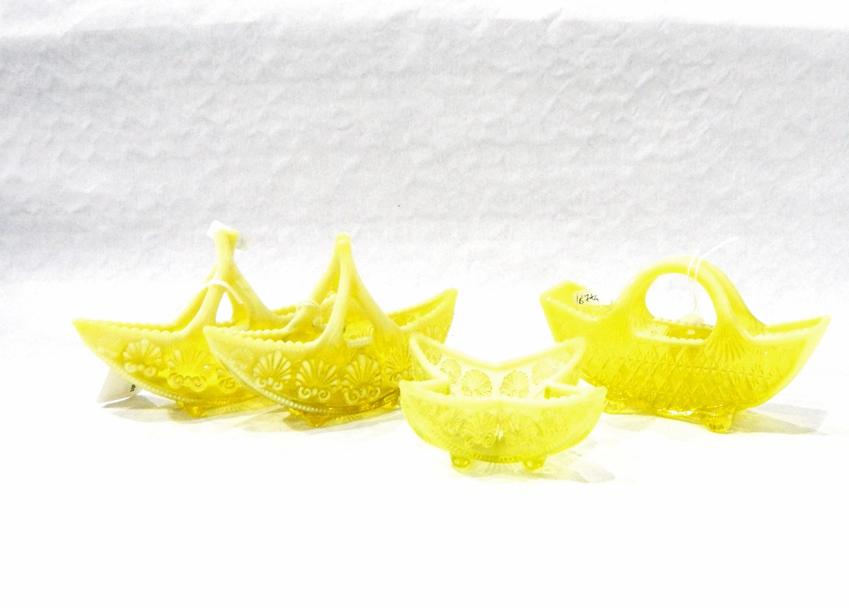 Pair of Victorian yellow uranium pressed glass baskets of navette form, possibly by George Davidson,