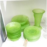 Early to mid 20th century moulded green glass table suite comprising a vase, two sizes of plates,