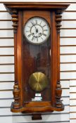 German walnut and glazed wall clock with enamel dial, brass beaded mounts,