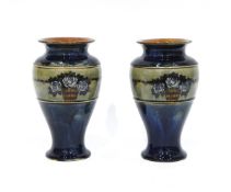 Pair of early 20th century Royal Doulton stoneware baluster-shaped vases with mottled blue ground,