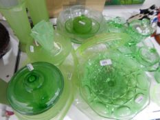 Quantity of green pressed glass including comport, dressing table set,