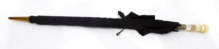 Large black vintage umbrella with a carved bone handle
