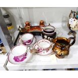 Collection of Sunderland lustre transfer-printed cups and saucers,