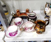 Collection of Sunderland lustre transfer-printed cups and saucers,