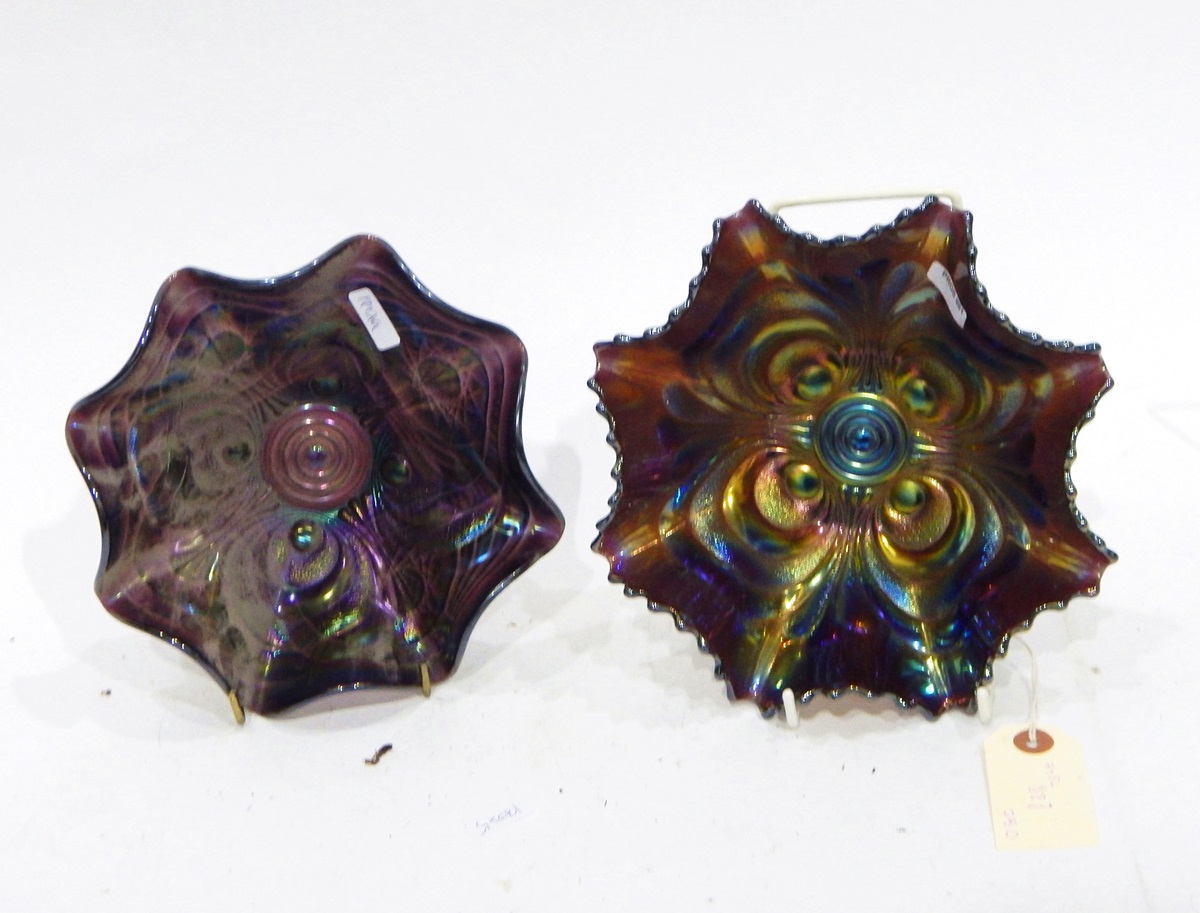 Amethyst carnival glass bowl decorated with flowers on three dolphin feet, - Image 3 of 7