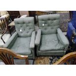 Pair of late 19th/early 20th century upholstered armchairs, on short mahogany legs,