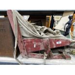 Metal tin marked 'Welfare Biscuits', an old seed spreader,