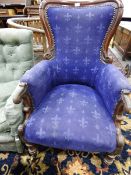 Victorian mahogany framed upholstered armchair on turned supports