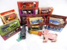 Quantity of Matchbox Yesteryear boxed cars, a vintage jigsaw, vintage wooden toys,