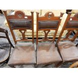 Three Edwardian pad back dining chairs with rexine upholstered seats, two bentwood chairs,