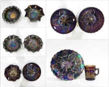 Five assorted carnival glass bowls and dishes in the 'Four Flowers Variant' pattern,