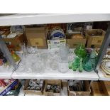 Large quantity of cut glass including large fruit bowl, vases, glasses, butter dish, cruet set etc.