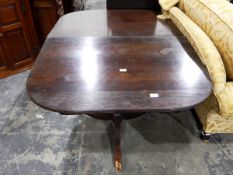 Mahogany twin-pedestal extending dining table