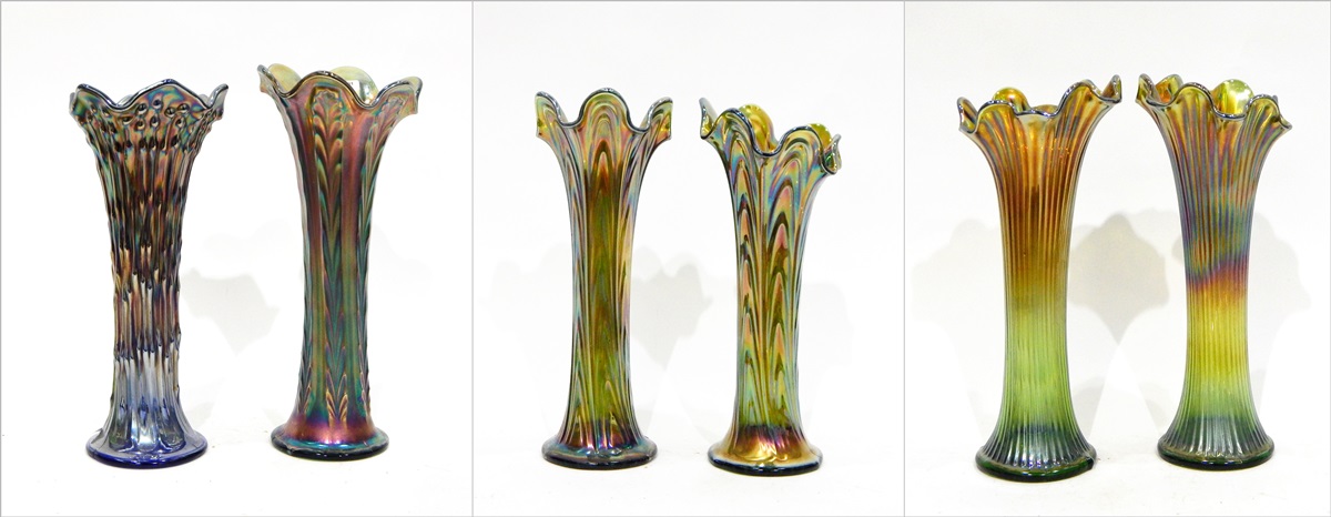 Two pairs of green tall ribbed carnival glass vases with flared rims, both 28cm high approx.