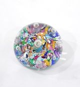 Glass paperweight, with scrambled millefiori canes surmounted by clear glass teardrops,