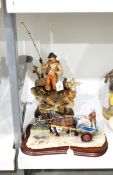 Tinted bisque figural scene of fisherman,