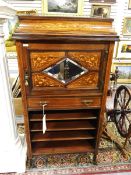 Edwardian inlaid rosewood caddy-top music cabinet having a pierced brass three-quarter gallery,