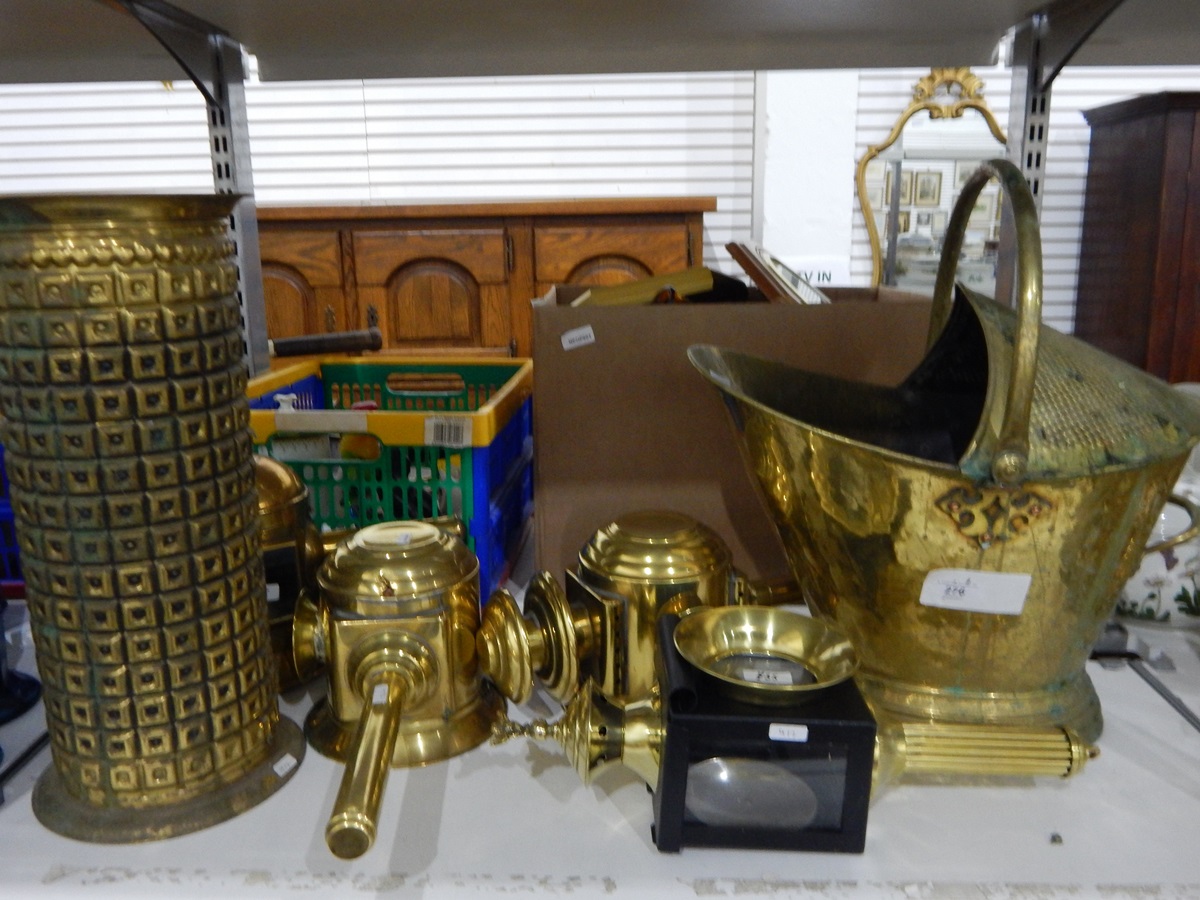 Quantity of brassware including a large coal scuttle, brass carriage lamps, a brass umbrella stand,