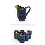 Imperial Diamond Lace purple carnival glass jug and a matching set of six tumblers (7)