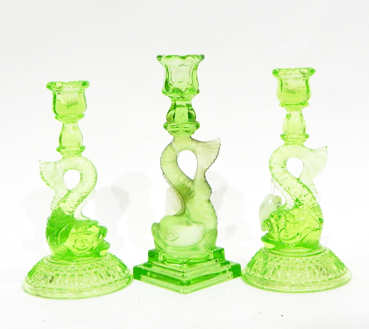 Pair of John Derbyshire green pressed glass lion ornaments, the recumbent lions on oval bases, - Image 3 of 3