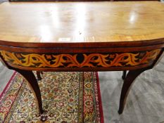 Georgian mahogany and satinwood inlaid foldover card table, the top with floral inlay,