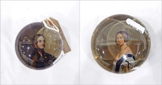 Two 19th century glass paperweights, one with a portrait of Prince Albert beneath the glass dome,