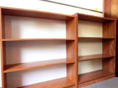 Two laminate three-tier bookshelves