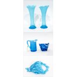 Pair of blue pressed glass vases of flared dimple design, 28cm high,