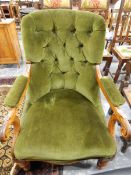 Victorian button-back open-arm mahogany framed easy chair on turned supports