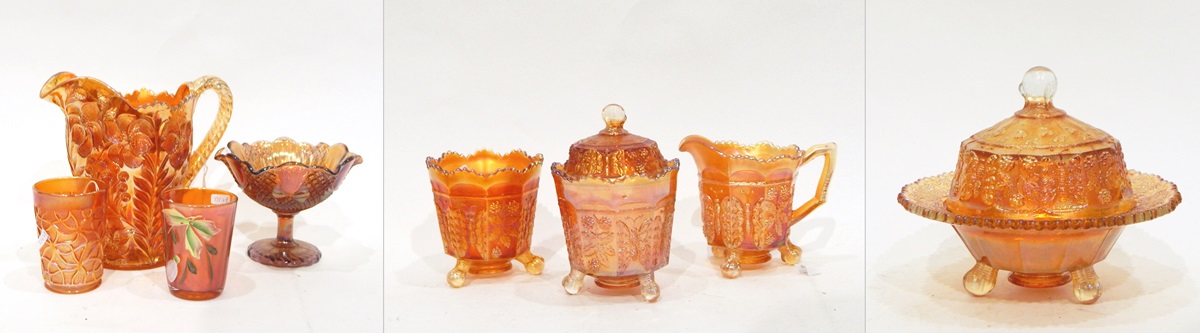 Marigold carnival glass set by Fenton, in the 'Butterfly and Berry' pattern, comprising jug,