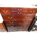 Early 20th century mahogany chest of drawers having an arrangement of four small drawers over four