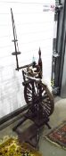 19th century spinning wheel, the wheel with intricately turned spokes,