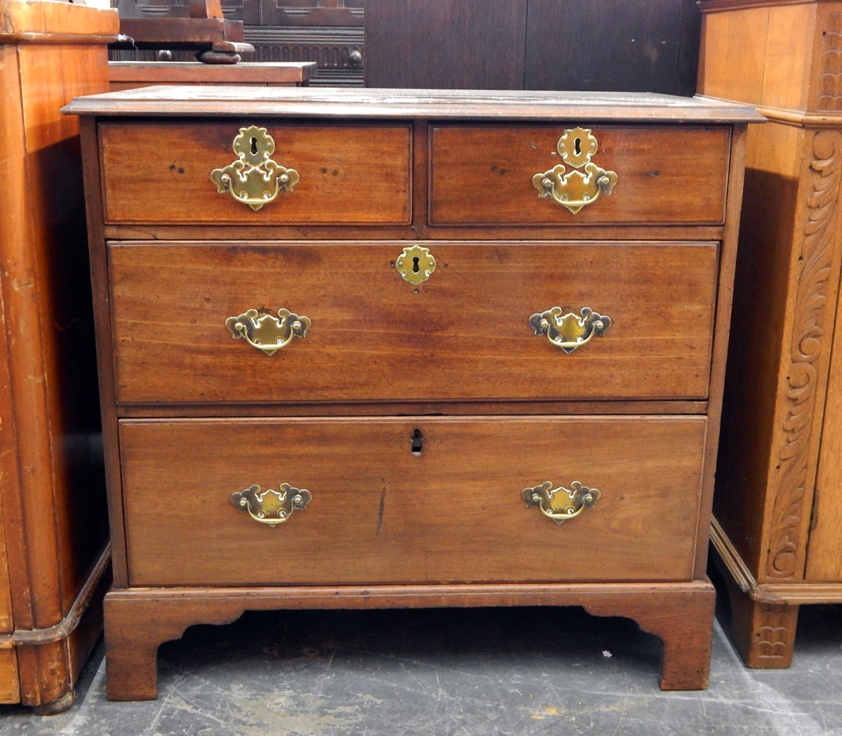 Georgian mahogany chest of drawers with moulded edge top, two short and two long graduated drawers,