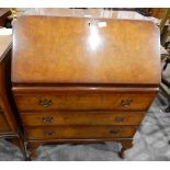 Circa 1940's burr walnut veneered bureau with usual pigeonhole interior,