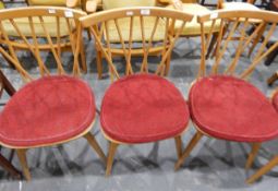 Set of four beech splat back dining chairs, the solid seats with cushions,
