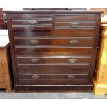 Early 20th century oak chest of two short and three long graduated drawers, oval brass handles,