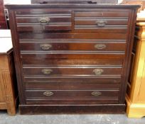 Early 20th century oak chest of two short and three long graduated drawers, oval brass handles,