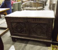 19th century dwarf carved oak two-door cupboard with floral and rosette decoration,
