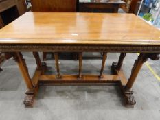 19th century walnut centre table with cross-banded rectangular top over carved column supports