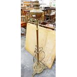 Late 19th century brass oil lamp on a telescopic stand,