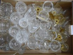 Large quantity of glass including wines, sherries, brandy balloons, fruit bowls, paraffin lamp,