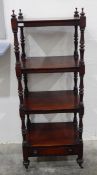 Early 19th century mahogany four-tier whatnot fitted a drawer to base,